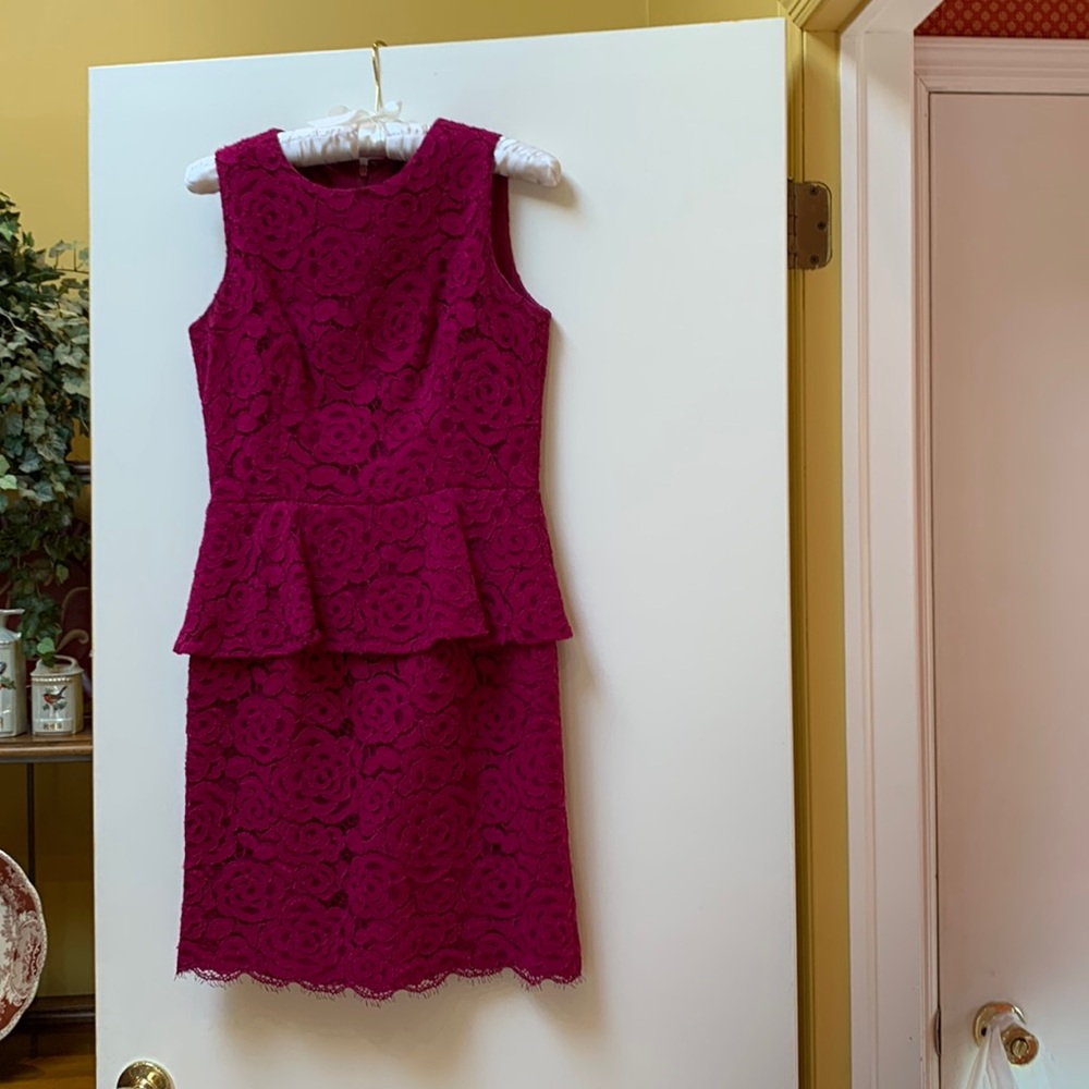 Lace sleeveless dress with peplum size 4